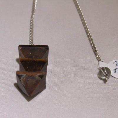 Tiger Eye  (Layered Pyramid) Pendulum  with clear crystal bead on the end of the chain.